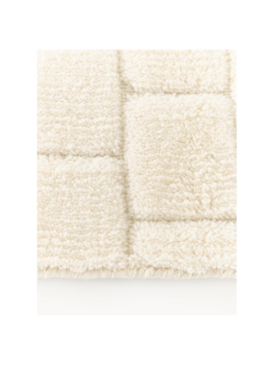 Tapis tissé à la main avec surface texturée Adley, 78 % laine, 20 % coton, 2 % polyester

Les tapis en laine peuvent perdre des fibres lors des premières semaines et des peluches peuvent se former, ce phénomène est naturel et diminue à mesure de votre usage et du temps, Blanc crème, larg. 80 x long. 150 cm (taille XS)