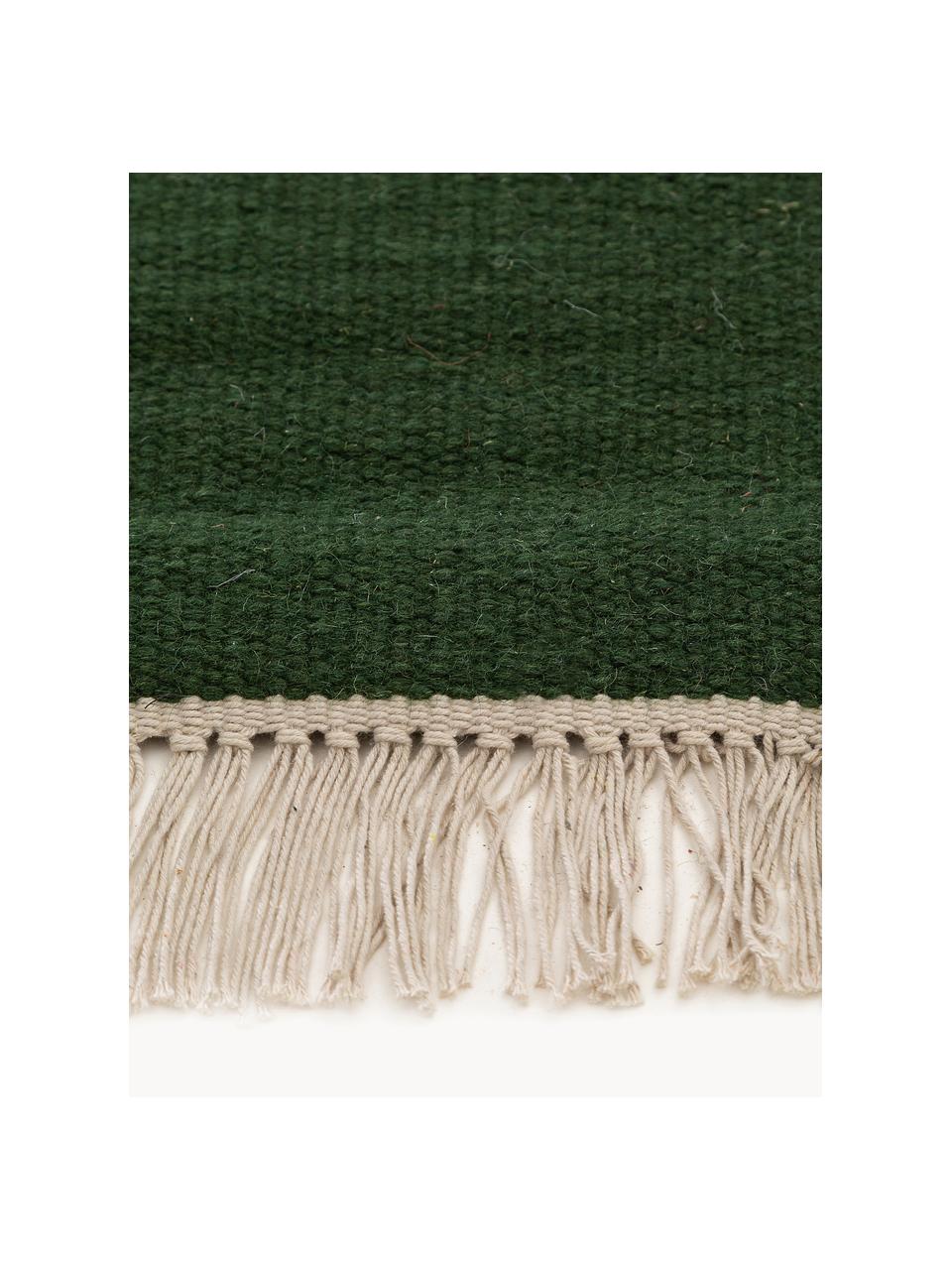 Ręcznie tkany dywan z wełny Liv, 80% wełna, 20% bawełna

Włókna dywanów wełnianych mogą nieznacznie rozluźniać się w pierwszych tygodniach użytkowania, co ustępuje po pewnym czasie, Ciemny zielony, S 80 x D 150 cm (Rozmiar XS)