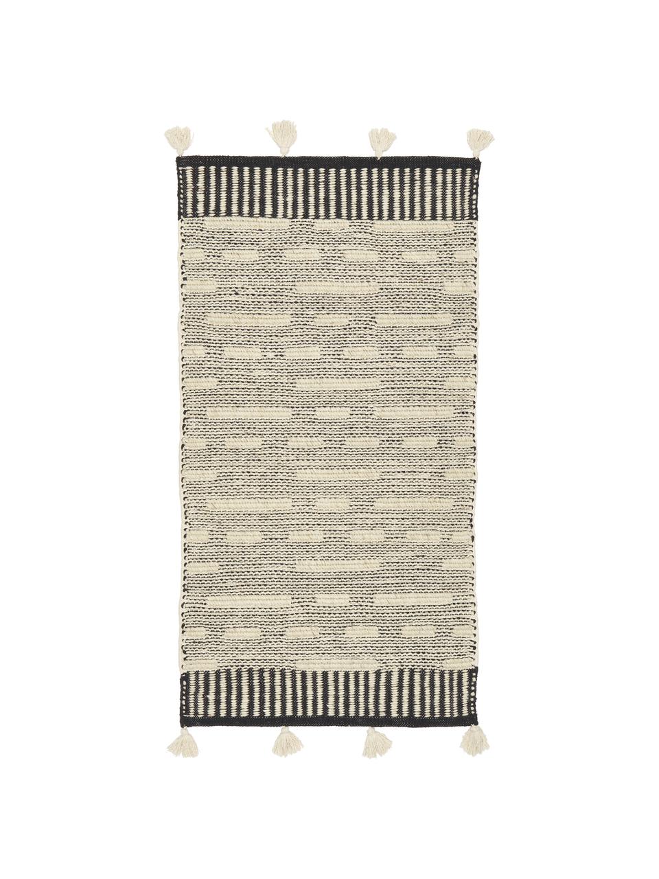 Tapis en laine à houppes tissé main Rue, 50 % laine, 50 % coton

Les tapis en laine peuvent perdre des fibres lors des premières semaines et des peluches peuvent se former, ce phénomène est naturel et diminue à mesure de votre usage et du temps, Beige & noir, imprimé, larg. 80 x long. 150 cm (taille XS)