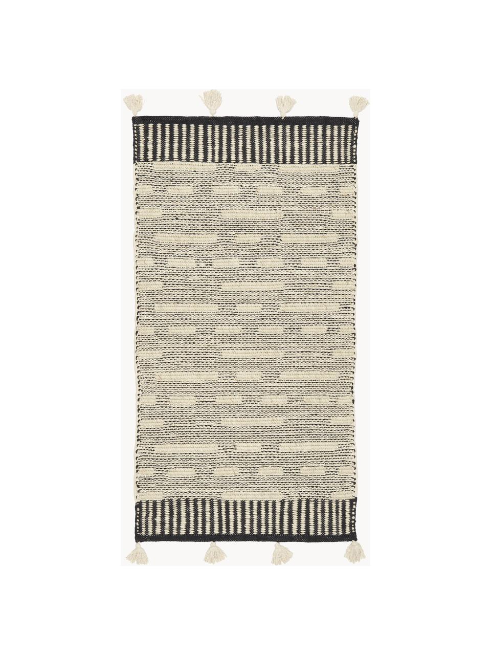 Ręcznie tkany dywan z wełny z frędzlami Rue, 50% wełna, 50% bawełna

Włókna dywanów wełnianych mogą nieznacznie rozluźniać się w pierwszych tygodniach użytkowania, co ustępuje po pewnym czasie, Beżowy, czarny, S 80 x D 150 cm (Rozmiar XS)
