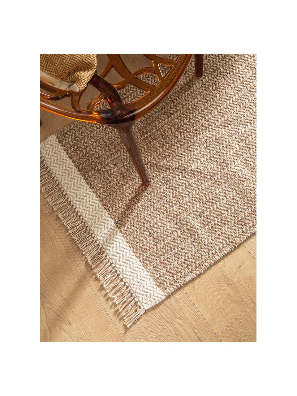 Passatoia in lana beige/crema tessuta a mano con frange Kim, 80% lana, 20% cotone
Nel caso dei tappeti di lana, le fibre possono staccarsi nelle prime settimane di utilizzo, questo e la formazione di lanugine si riducono con l'uso quotidiano, Beige, crema, Larg. 80 x Lung. 250 cm