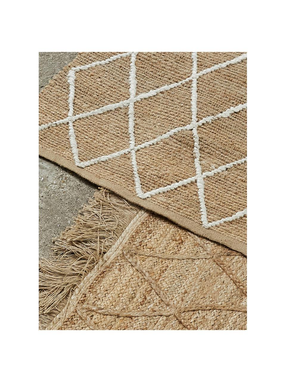 Felpudo artesanal de yute Jason, 100% yute

Como las alfombras de yute son ásperas al tacto, son menos adecuadas para el contacto directo con la piel., Beige, An 50 x L 80 cm