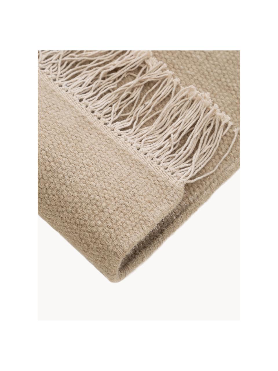 Ručne tkaný vlnený koberec so strapcami Liv, 80 % vlna, 20 %  polyester

V prvých týždňoch používania môžu vlnené koberce uvoľňovať vlákna, tento jav zmizne po niekoľkých týždňoch používania, Béžová, Š 80 x D 150 cm (veľkosť XS)