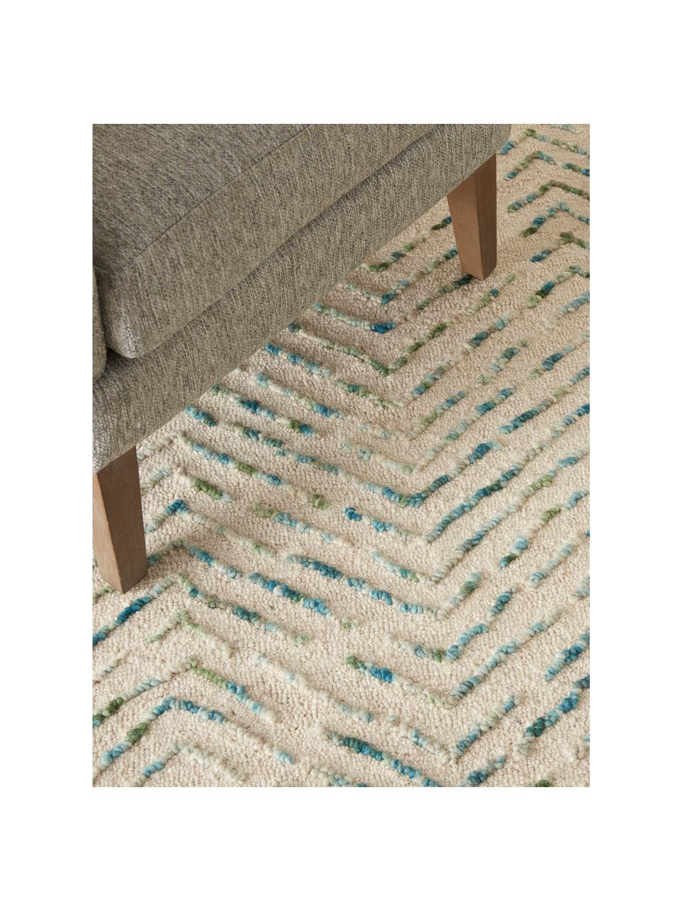 Tapis en laine tissé à la main avec surface texturée Colorado, 100 % laine

Les tapis en laine peuvent perdre des fibres lors des premières semaines et des peluches peuvent se former, ce phénomène est naturel et diminue à mesure de votre usage et du temps, Blanc crème, tons verts, tons bleus, larg. 120 x long. 180 cm (taille S)