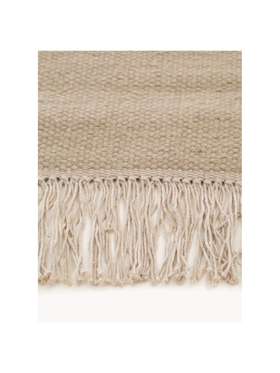 Tapis en laine tissé à la main avec franges Liv, 80 % laine, 20 % coton

Les tapis en laine peuvent perdre des fibres lors des premières semaines et des peluches peuvent se former, ce phénomène est naturel et diminue à mesure de votre usage et du temps, Beige, larg. 80 x long. 150 cm (taille XS)