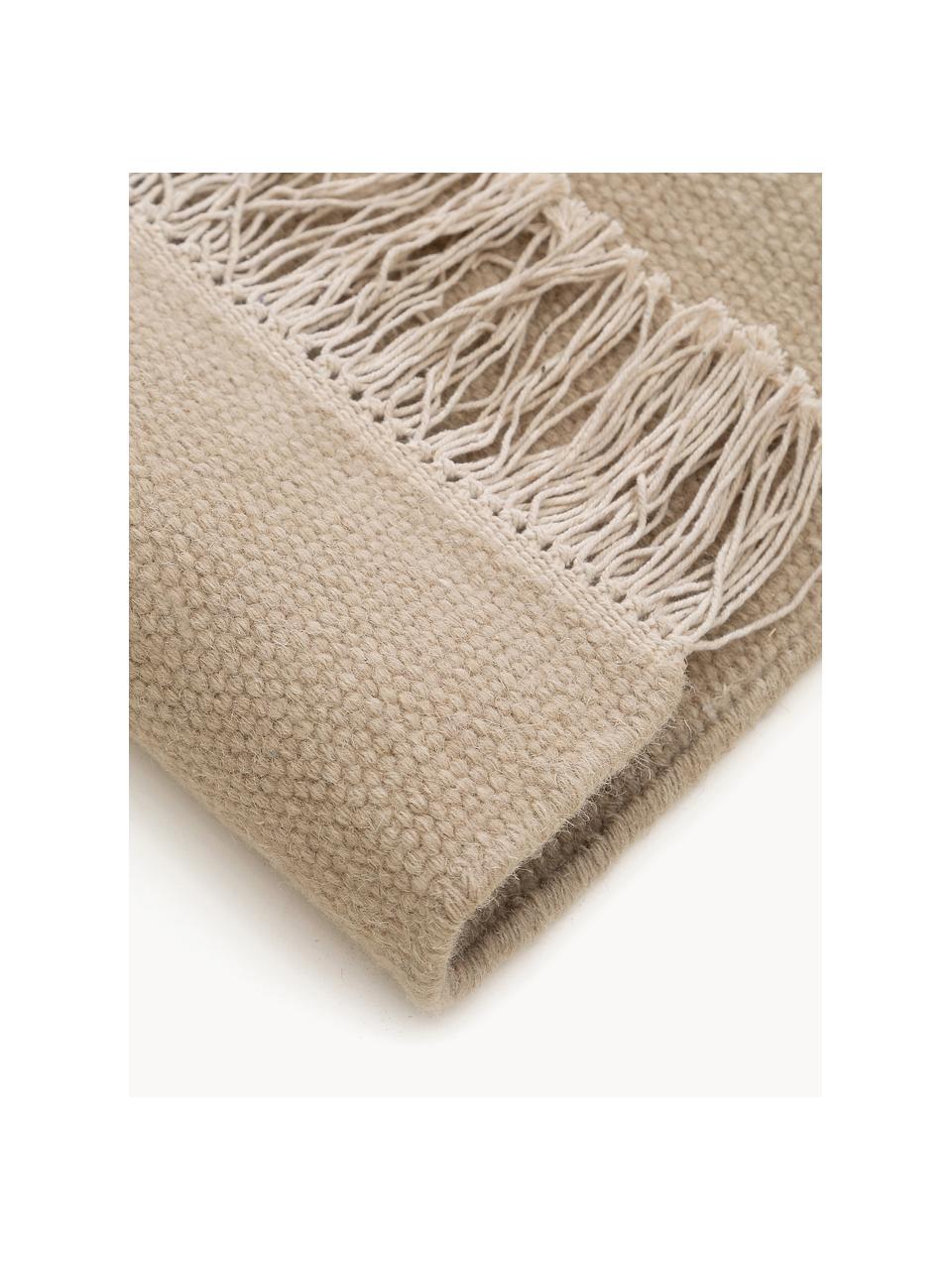 Tapis en laine tissé à la main avec franges Liv, 80 % laine, 20 % coton

Les tapis en laine peuvent perdre des fibres lors des premières semaines et des peluches peuvent se former, ce phénomène est naturel et diminue à mesure de votre usage et du temps, Beige, larg. 80 x long. 150 cm (taille XS)