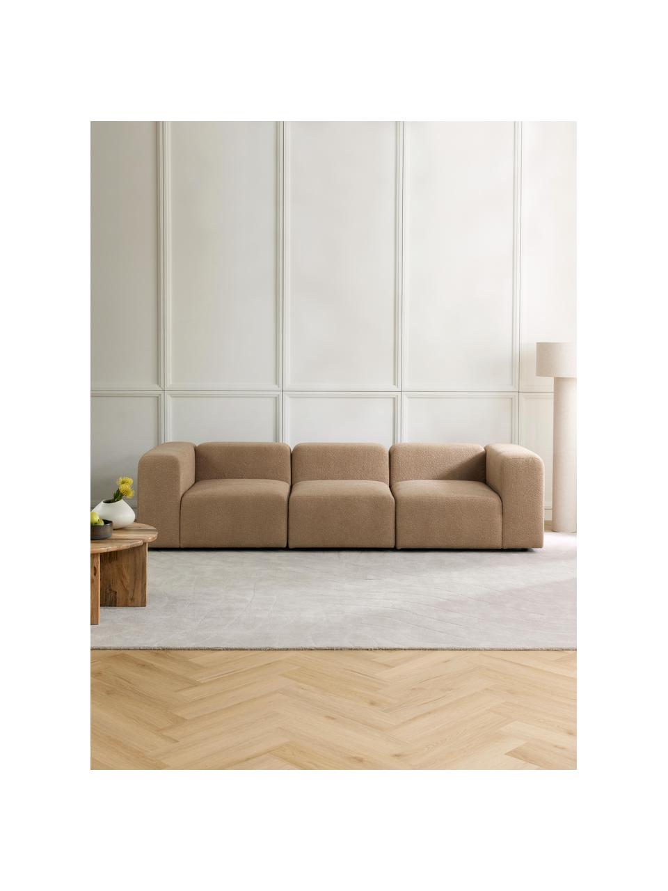 Divano componibile 4 posti in bouclé Lena, Rivestimento: bouclé (93% poliestere, 6, Struttura: legno di pino, compensato, Piedini: plastica, Bouclé marrone chiaro, Larg. 284 x Prof. 106 cm