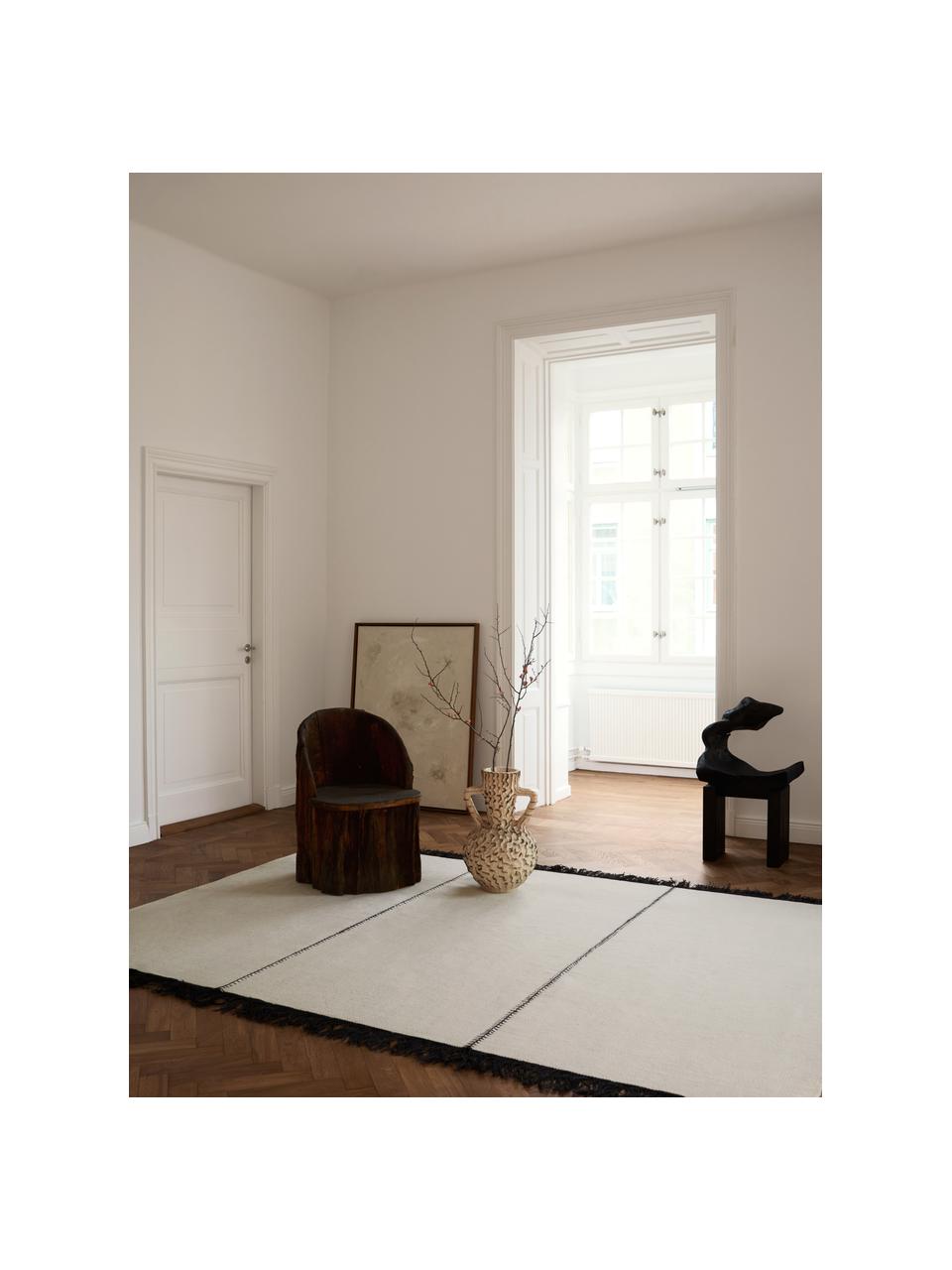 Tapis en laine tissé à la main avec franges Stitches, 100 % laine

Les tapis en laine peuvent perdre des fibres lors des premières semaines et des peluches peuvent se former, ce phénomène est naturel et diminue à mesure de votre usage et du temps, Blanc cassé, noir, larg. 170 x long. 240 cm (taille M)