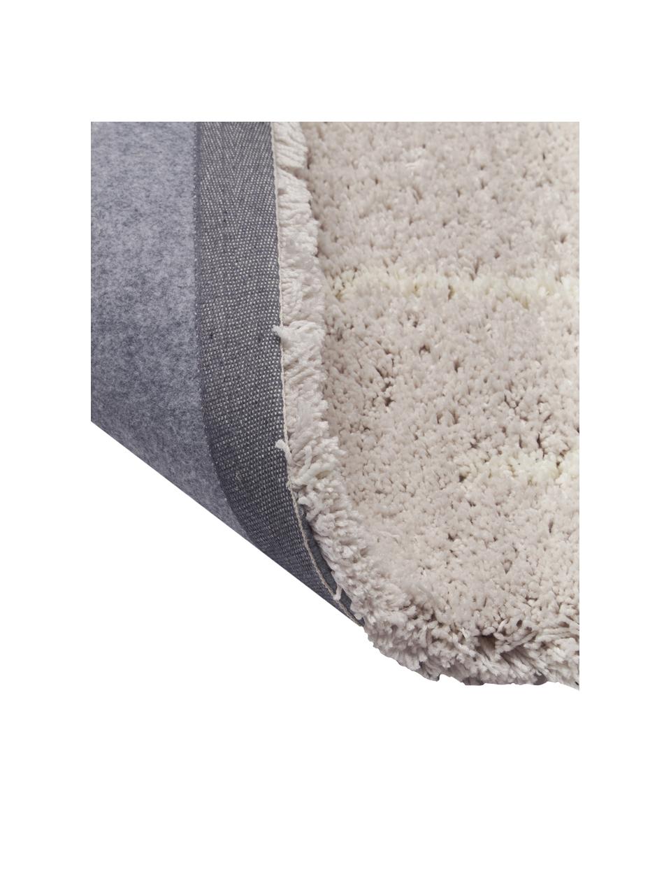 Pluizig hoogpolig vloerkleed Amelie in beige, handgetuft, Bovenzijde: 100% polyester, Onderzijde: gerecycled polyester, Beige, crèmewit, B 80 x L 150 cm (maat XS)