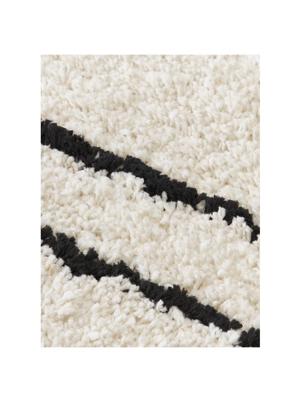 Ručně všívaný kulatý načechraný koberec s vysokým vlasem Dunya, Béžová, černá, Ø 140 cm