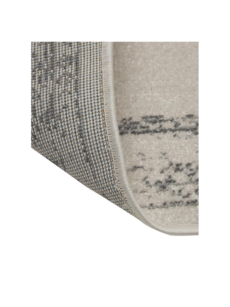 Tapis gris extérieur / intérieur style vintage Everly, 100 % polypropylène, Gris, larg. 80 x long. 150 cm (taille XS)