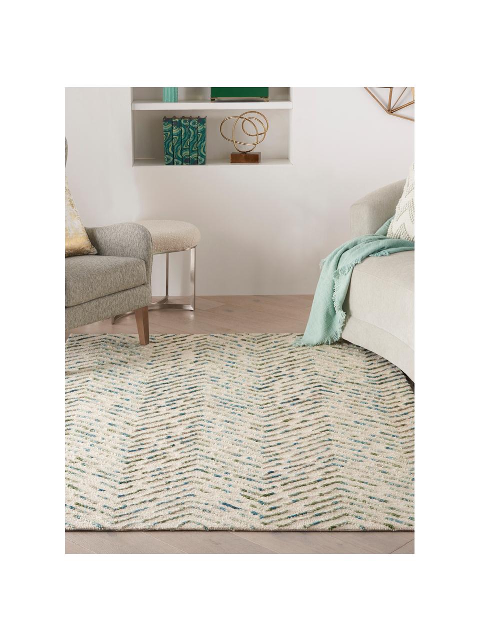Ręcznie tkany dywan z wełny z wypukłą strukturą Colorado, 100% wełna

Włókna dywanów wełnianych mogą nieznacznie rozluźniać się w pierwszych tygodniach użytkowania, co ustępuje po pewnym czasie, Kremowobiały, odcienie zielonego, odcienie niebieskiego, S 120 x D 180 cm (Rozmiar S)