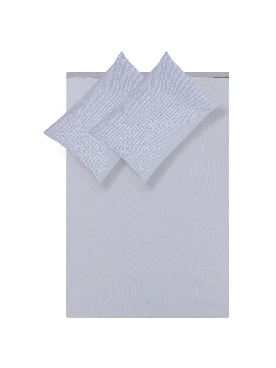 Set lenzuola in cotone Polsino, Cotone
La parure copripiumino in cotone è piacevolmente morbida sulla pelle, assorbe bene l'umidità ed è adatta per chi soffre di allergie., Bianco, blu, blu scuro, 260 x 295 cm + 2 federe 50 x 80 cm x lenzuola 180 x 200 cm