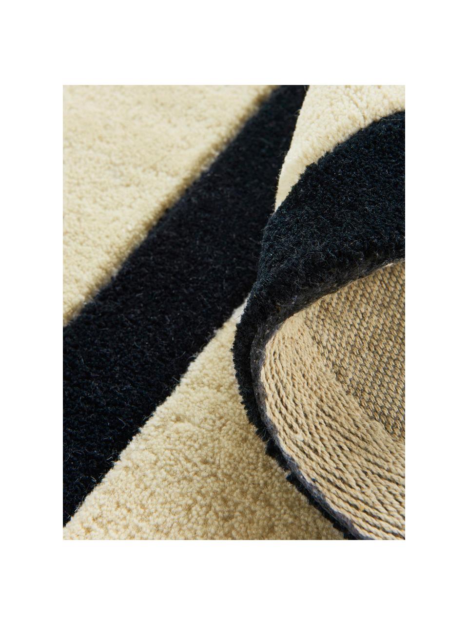 Okrúhly ručne tuftovaný vlnený koberec Peace Out, Krémovobiela, čierna