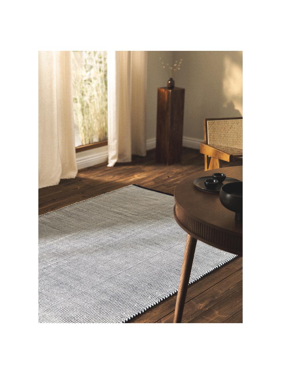 Alfombra artesanal de lana Amaro, 67% lana (certificado RWS), 33% algodón 

Las alfombras de lana se pueden aflojar durante las primeras semanas de uso, la pelusa se reduce con el uso diario., Negro, blanco crema, An 300 x L 400 cm (Tamaño XL)