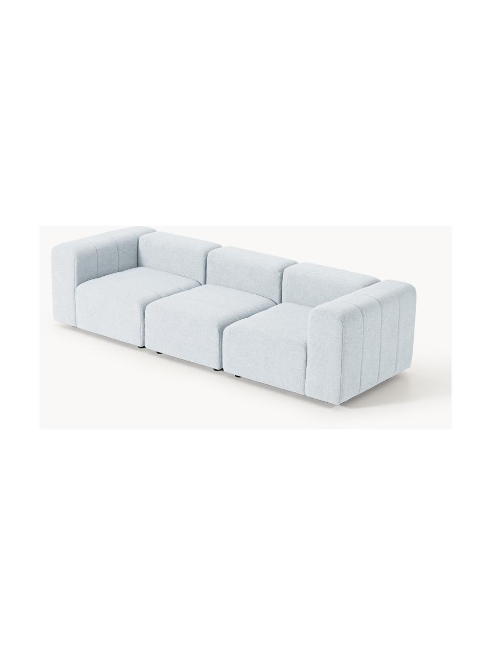 Divano componibile 4 posti in bouclé Lena, Rivestimento: bouclé (93% poliestere, 6, Struttura: legno di faggio, truciola, Piedini: plastica, Bouclé azzurro, Larg. 287 x Prof. 106 cm