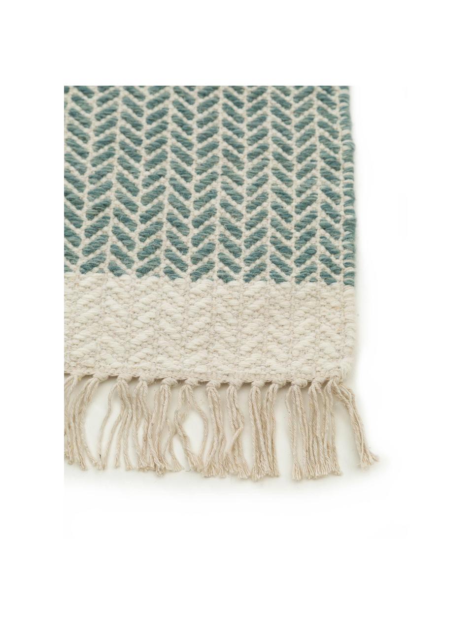 Alfombra corredor artesanal de lana con flecos Kim, 80% lana, 20% algodón

Las alfombras de lana se pueden aflojar durante las primeras semanas de uso, la pelusa se reduce con el uso diario., Verde, beige, An 70 x L 200 cm