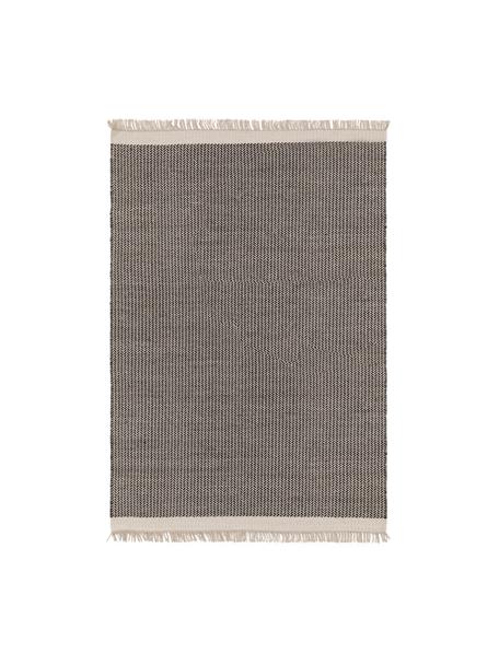 Ręcznie tkany dywan z wełny z frędzlami Kim, 80% wełna, 20% bawełna
Włókna dywanów wełnianych mogą nieznacznie rozluźniać się w pierwszych tygodniach użytkowania, co ustępuje po pewnym czasie, Czarny, kremowobiały, S 80 x D 120 cm (Rozmiar XS)