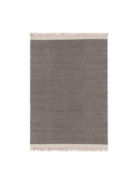 Ręcznie tkany dywan z wełny z frędzlami Kim, 80% wełna, 20% bawełna

Włókna dywanów wełnianych mogą nieznacznie rozluźniać się w pierwszych tygodniach użytkowania, co ustępuje po pewnym czasie, Czarny, beżowy, S 200 x D 300 cm (Rozmiar L)