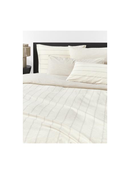 Gewaschener Baumwoll-Bettdeckenbezug Caspian mit Jacquard-Streifen, 100 % Baumwolle

Fadendichte 110 TC, Standard Qualität

Bettwäsche aus Baumwolle fühlt sich auf der Haut angenehm weich an, nimmt Feuchtigkeit gut auf und eignet sich für Allergiker.
Durch ein besonderes Waschungsverfahren erhält der Stoff eine robuste, unregelmäßige Stonewash-Optik. Außerdem wird der Stoff dadurch weich und geschmeidig im Griff und erhält eine natürliche Knitter-Optik, die kein Bügeln erfordert und Gemütlichkeit ausstrahlt.

Das in diesem Produkt verwendete Material ist schadstoffgeprüft und zertifiziert nach STANDARD 100 by OEKO-TEX®, 4854CIT, CITEVE, Beige, Off White, B 135 x L 200 cm