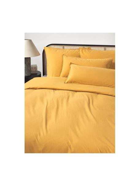 Housse de couette en coton délavé Darlyn, 100 % coton
150 fils au pouce carré, qualité Standard

La literie en coton procure une agréable sensation de douceur sur la peau, absorbe bien l'humidité et convient aux personnes allergiques.

L'aspect robuste et irrégulier de stonewash provient d'un procédé de lavage spécial. Il rend également le tissu doux et souple au toucher, tout en lui procurant un aspect froissé naturel, ne nécessitant pas de repassage.

Le matériau est certifié STANDARD 100 OEKO-TEX®, 4265CIT, CITEVE., Jaune moutarde, larg. 140 x long. 200 cm