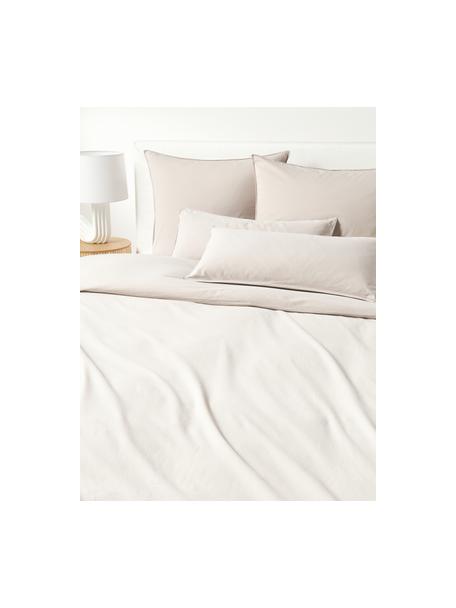 Housse de couette en coton délavé Darlyn, 100 % coton
150 fils au pouce carré, qualité Standard

La literie en coton procure une agréable sensation de douceur sur la peau, absorbe bien l'humidité et convient aux personnes allergiques.

L'aspect robuste et irrégulier de stonewash provient d'un procédé de lavage spécial. Il rend également le tissu doux et souple au toucher, tout en lui procurant un aspect froissé naturel, ne nécessitant pas de repassage.

Le matériau est certifié STANDARD 100 OEKO-TEX®, 4265CIT, CITEVE., Beige, larg. 260 x long. 240 cm
